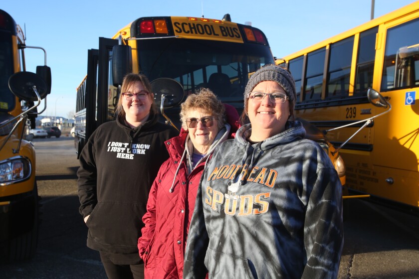 From right, Angie Richards, daughter; Diane Anderson, grandma; and Shelby Fry, granddaughter, as seen on Monday, Jan. 6, 2025, all drive buses for Moorhead Public Schools.