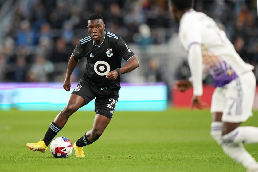 Minnesota United FC forward Bongokuhle Hlongwane dribbles the ball during the first half of an April 15, 2023, game against Orlando City SC in St. Paul.