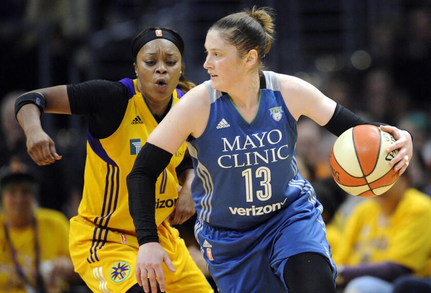 Minnesota Lynx guard Lindsay Whalen (13) moves the ball against Los Angeles Sparks guard Odyssey Sims (1) during the second half in Game 3 of the WNBA Finals at Staples Center in Los Angeles on Sept. 29, 2017. Gary A. Vasquez / USA TODAY Sports