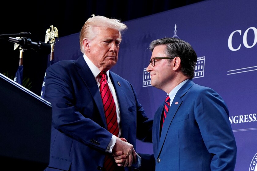 FILE PHOTO: U.S. President Donald Trump attends a House Republican members conference meeting in Miami